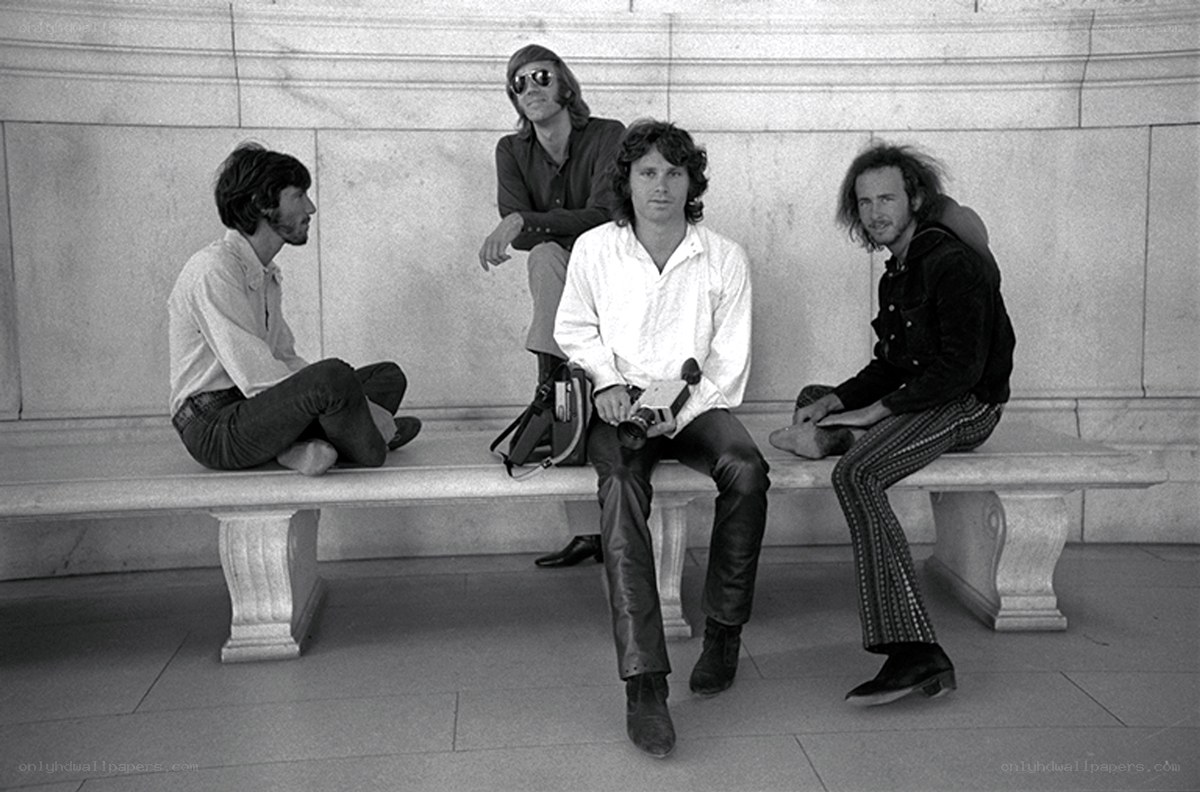 band members on a bench