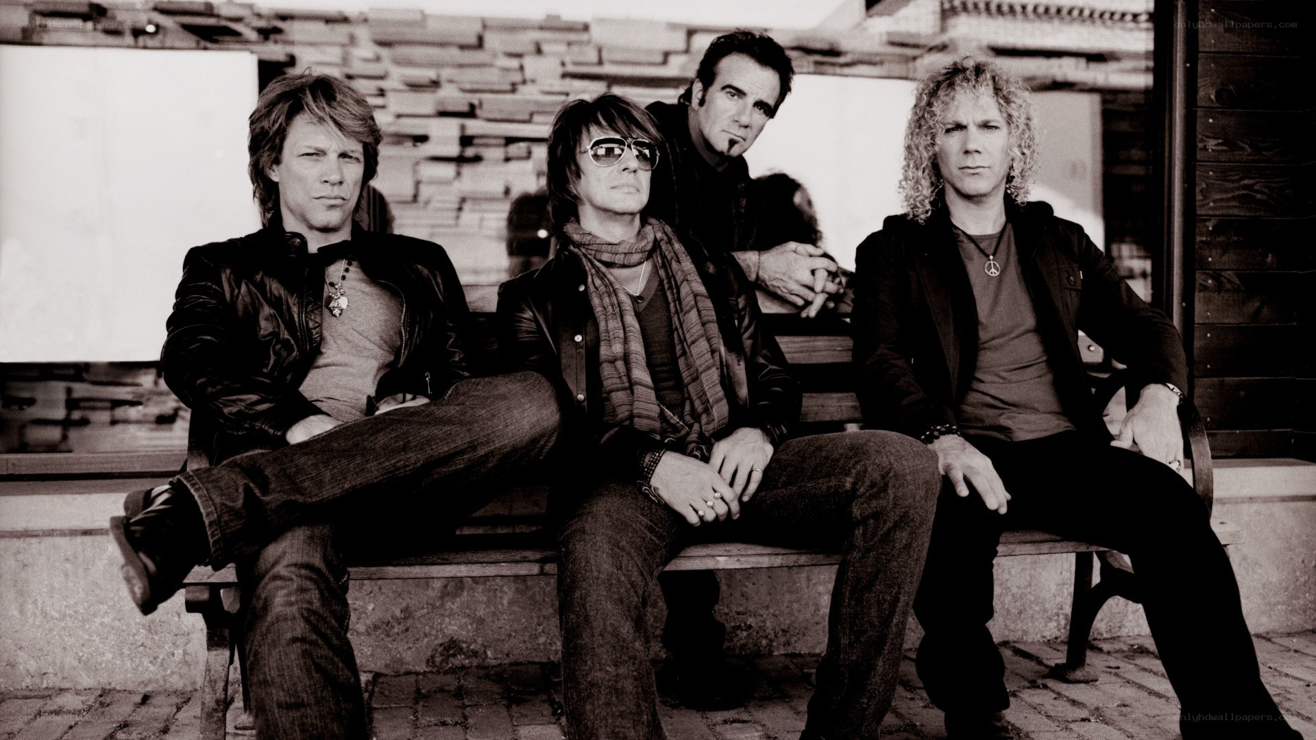 band members on a bench