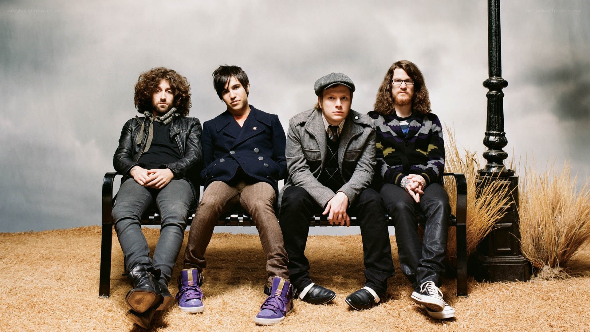 band members on a bench