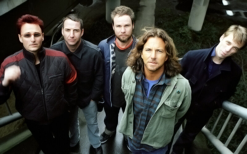 band members on a bridge