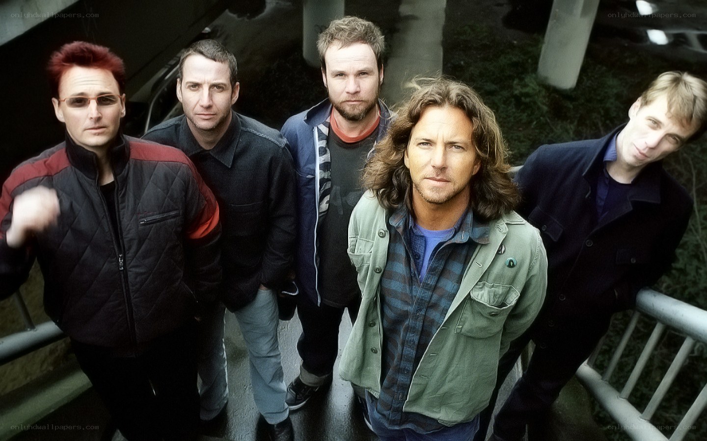 band members on a bridge