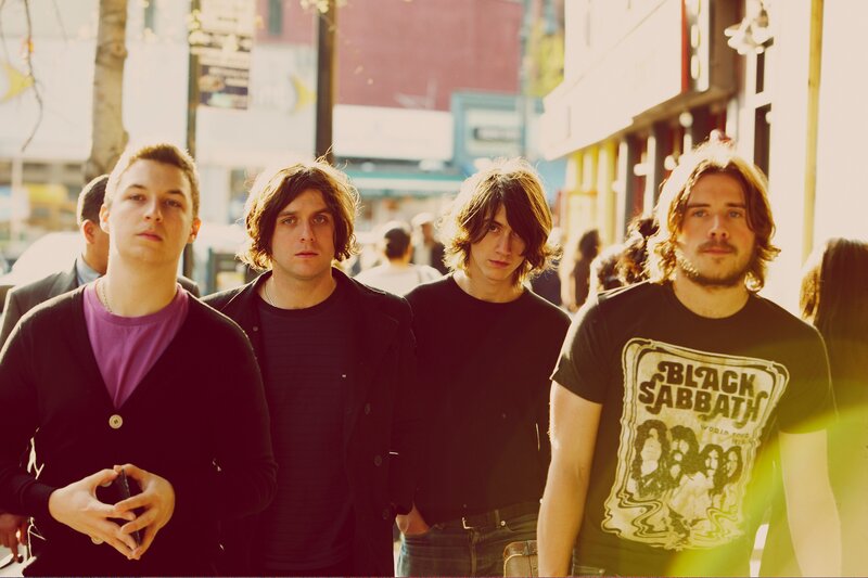 band members on a city street