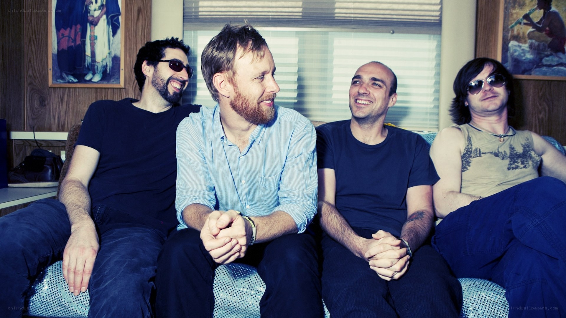 band members on a couch