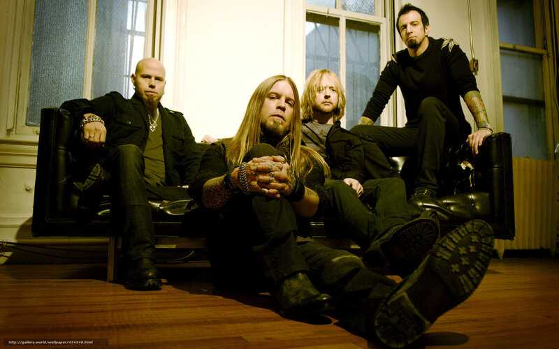 band members on a couch