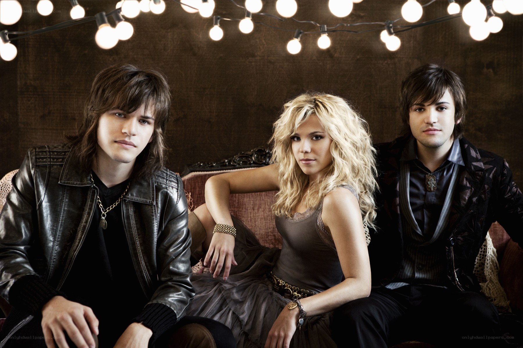 band members on a couch