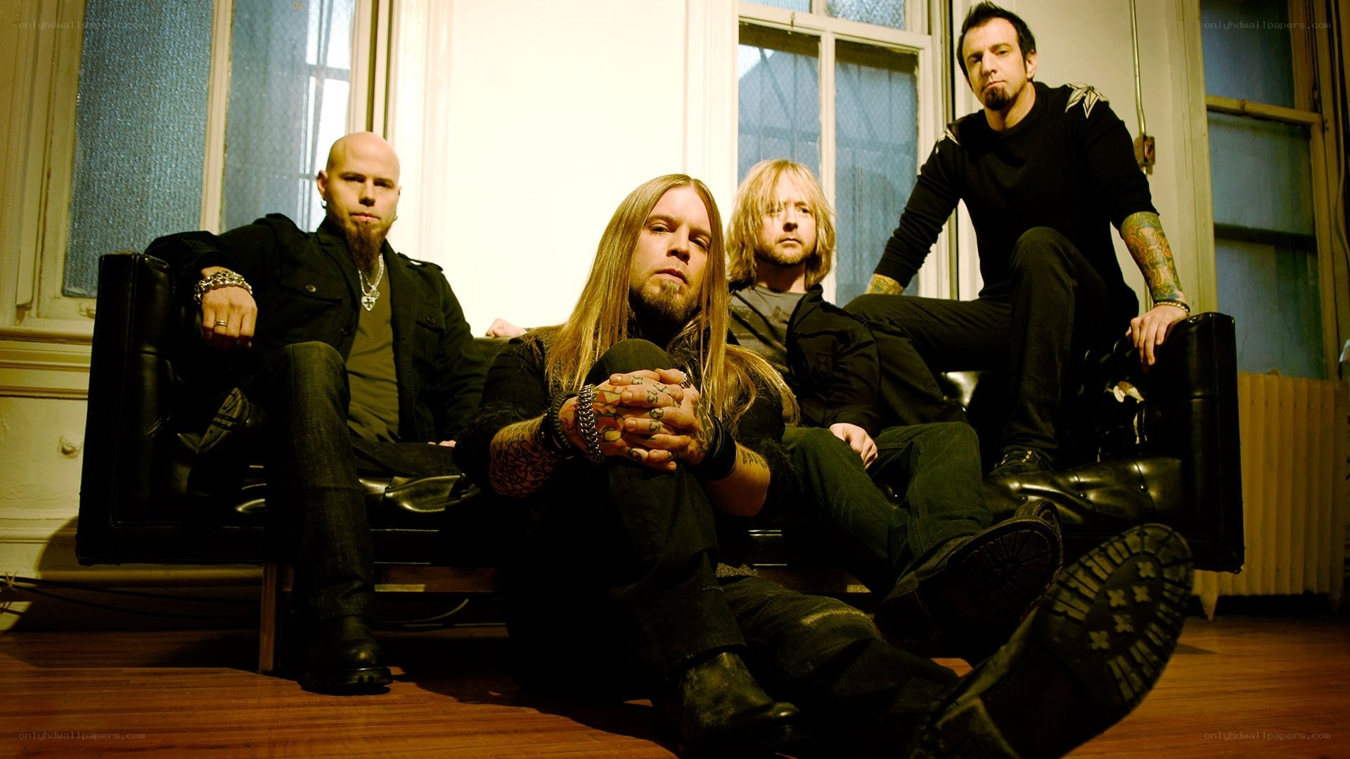 band members on a couch