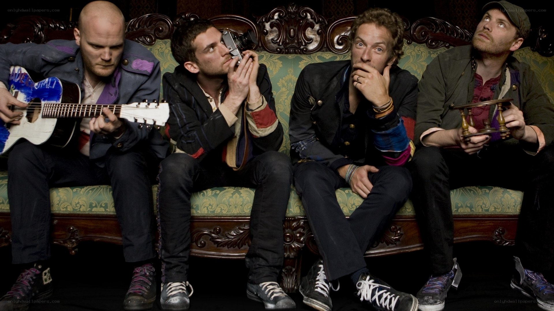 band members on a couch
