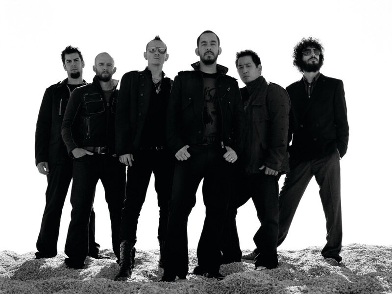 band members on a hill