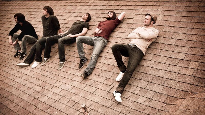 band members on a roof