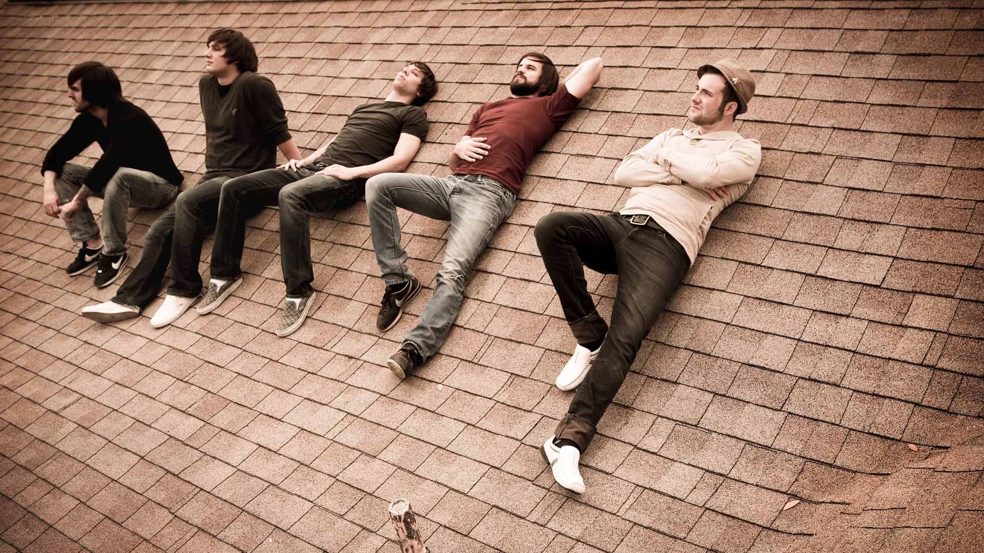 band members on a roof