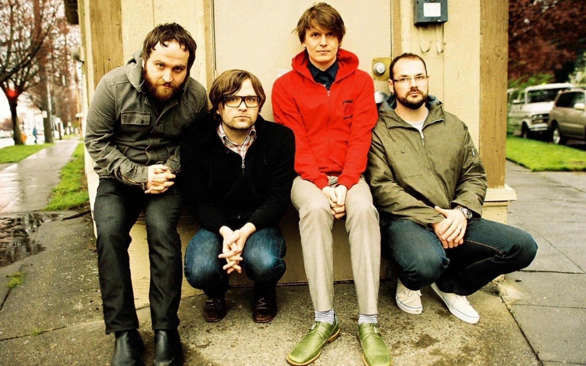 band members on a sidewalk