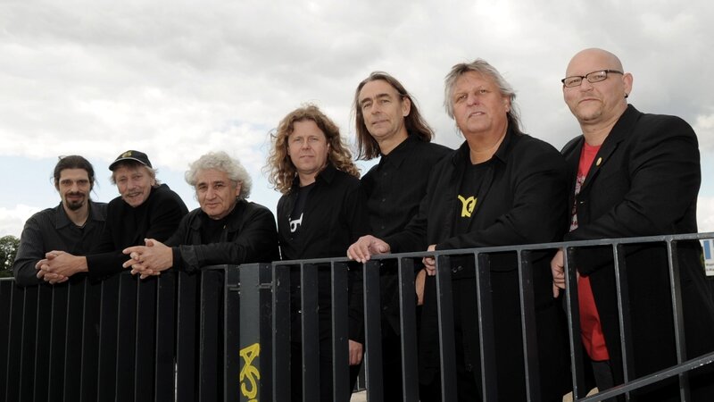 band members on balcony