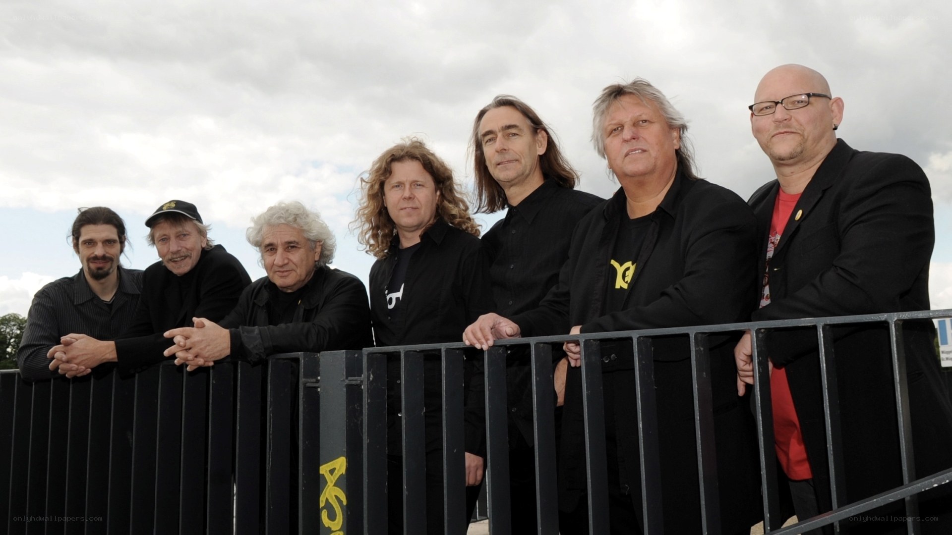 band members on balcony