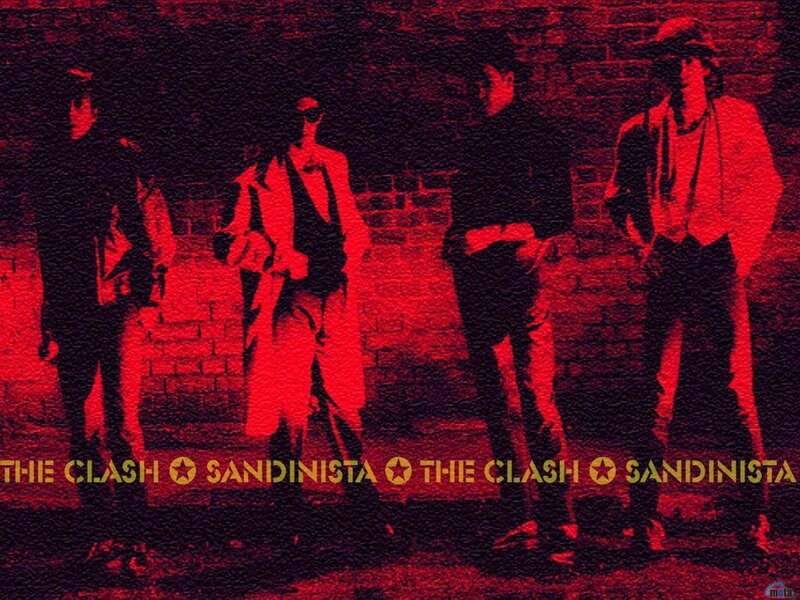 Band Members on Brick Wall