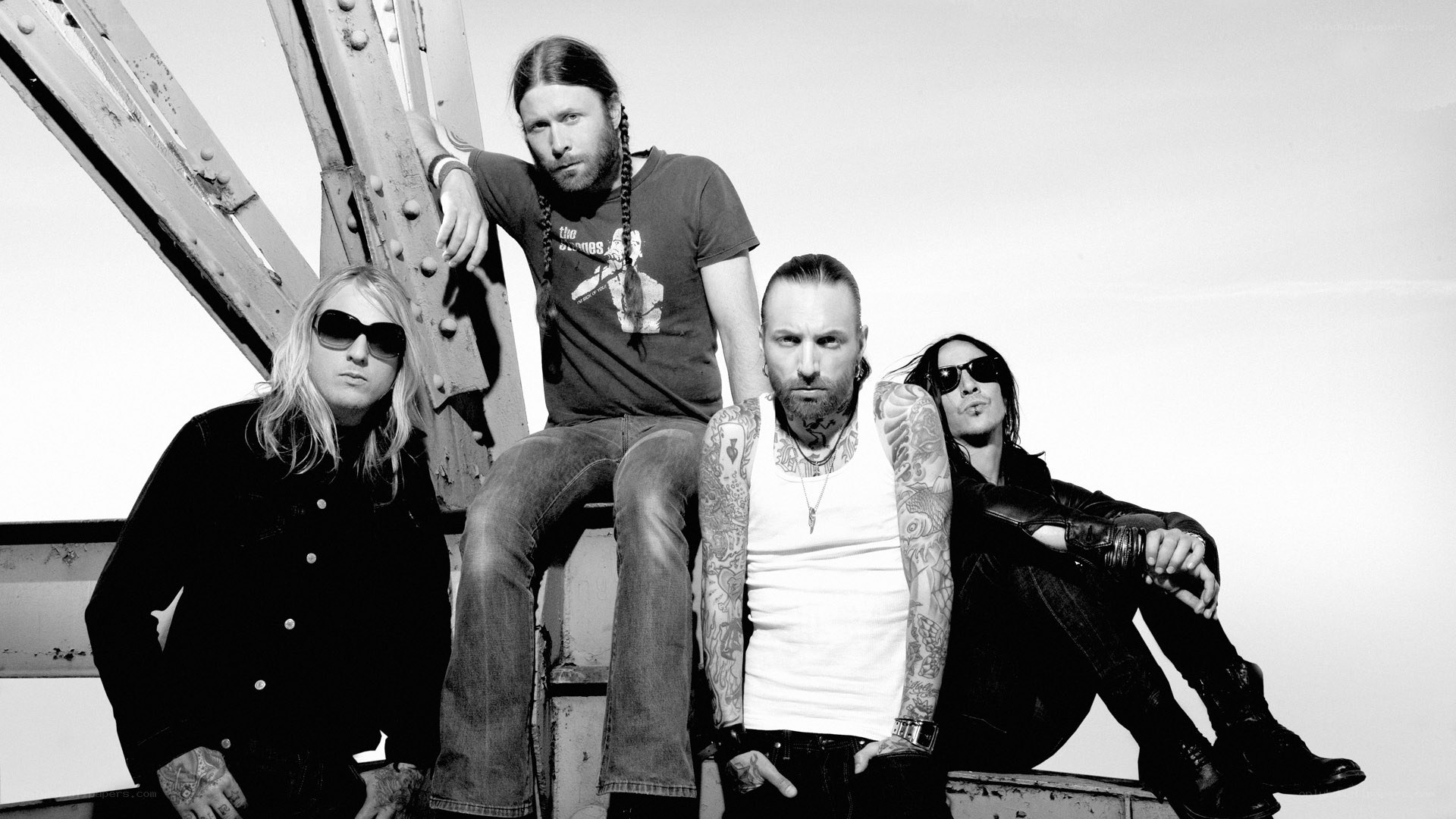 band members on metal structure