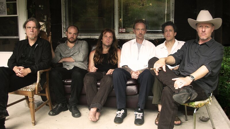 band members on porch