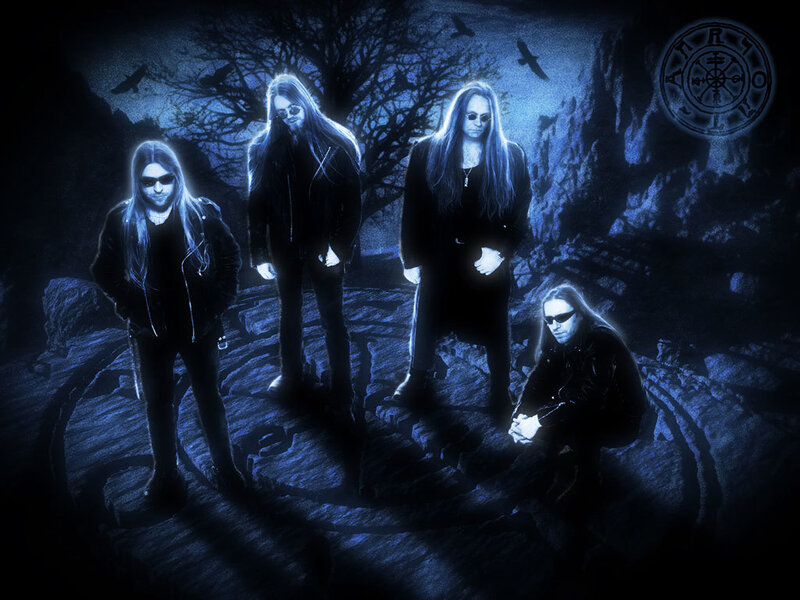 Band Members on Rocks — Blue