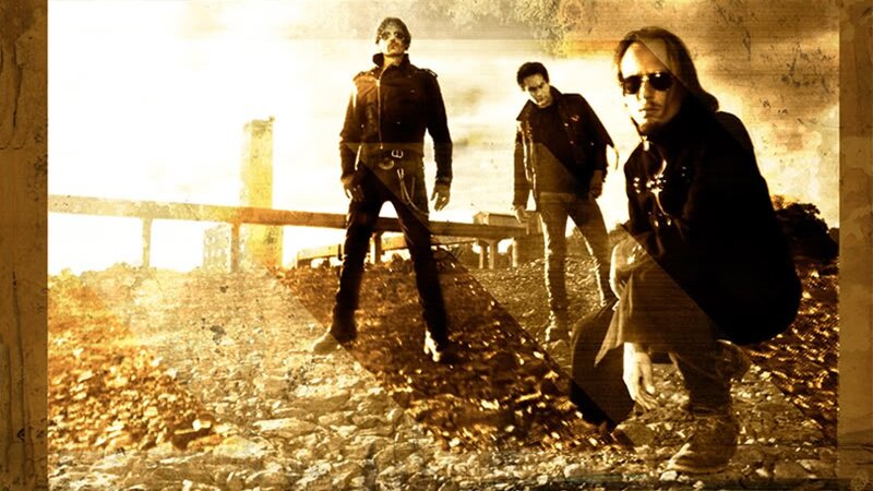 band members on rocky terrain