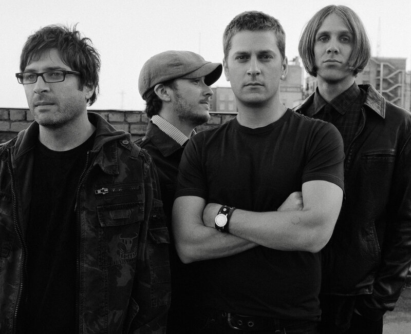 band members on rooftop