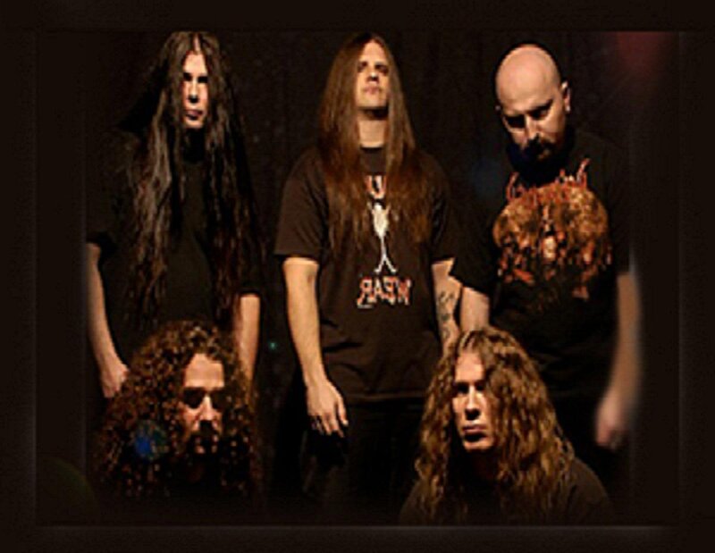 Band Members on Stage — Black, Serious
