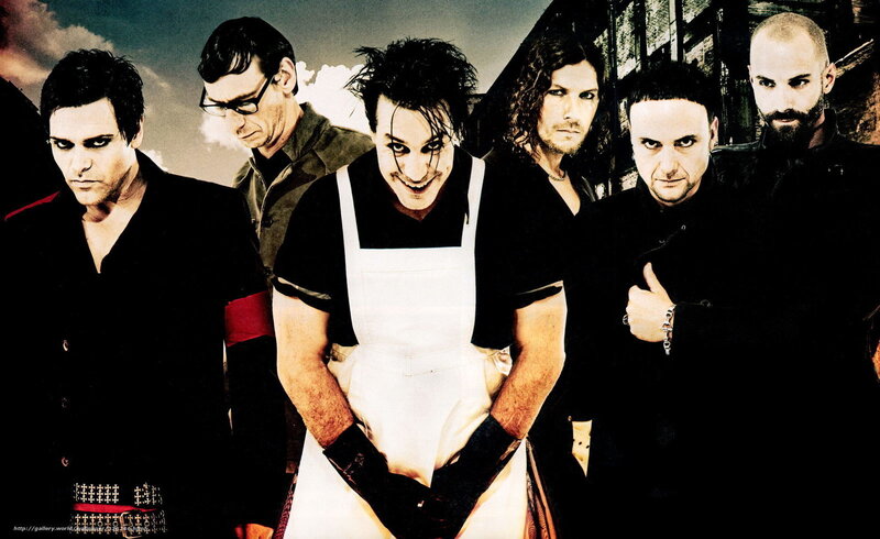 Band Members Posing — Black, Dramatic, Photograph, Apron, Glasses