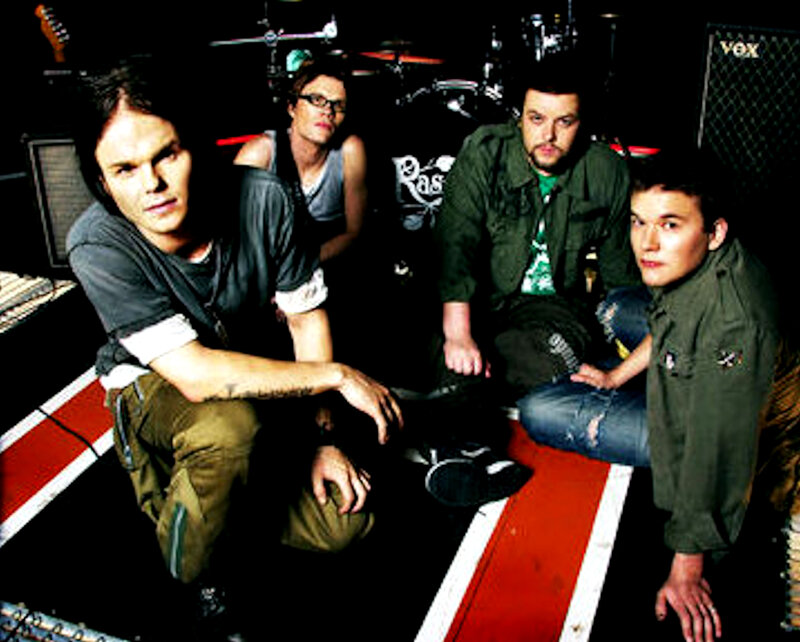 Band Members Posing — Black, Serious, Photograph, Guitar Amplifier