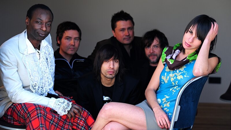Band Members Posing — Blue, Neutral