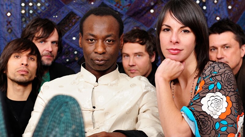 Band Members Posing — Blue, Serious