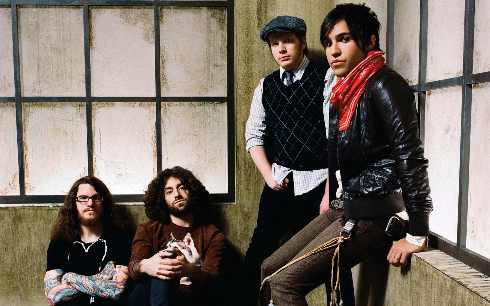band members posing in industrial setting