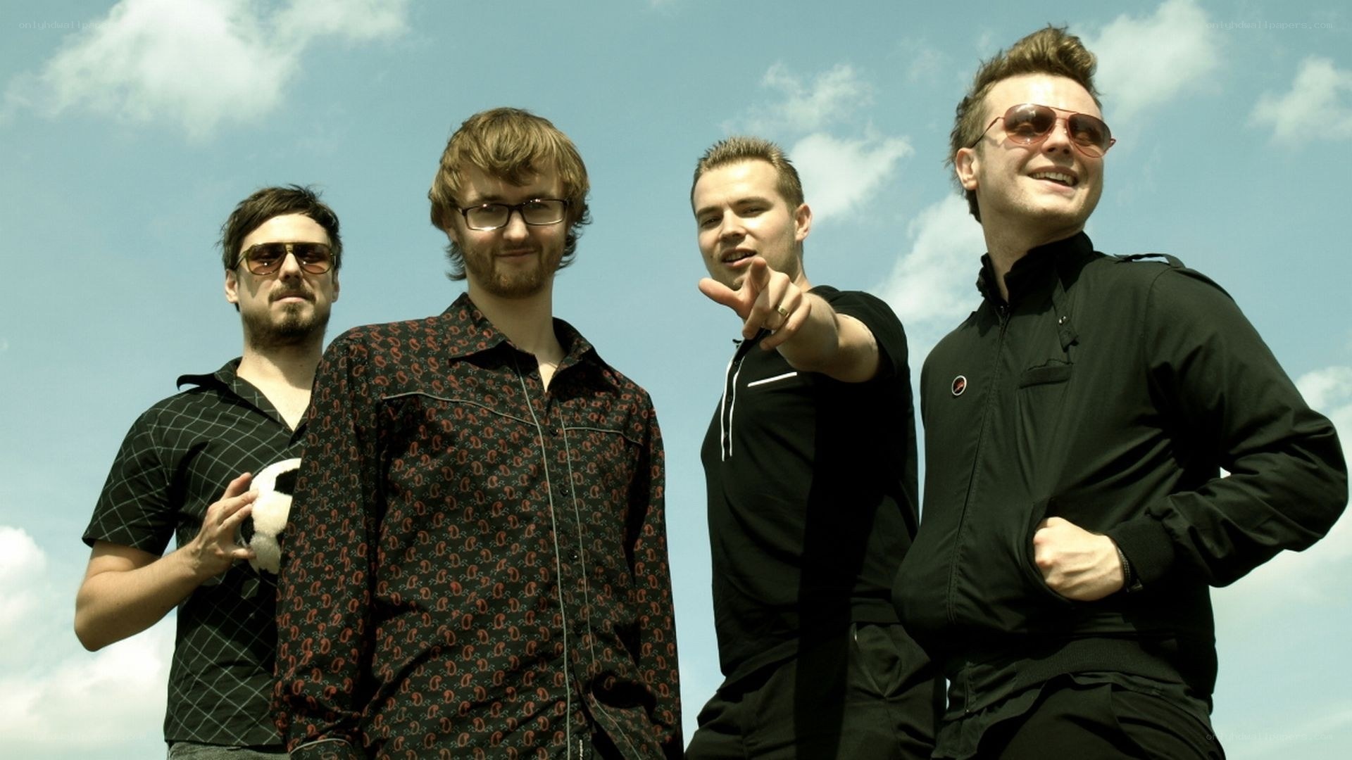 band members posing outdoors