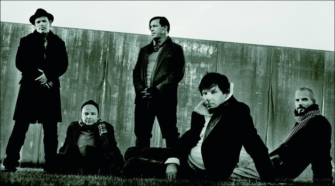 band members posing outdoors