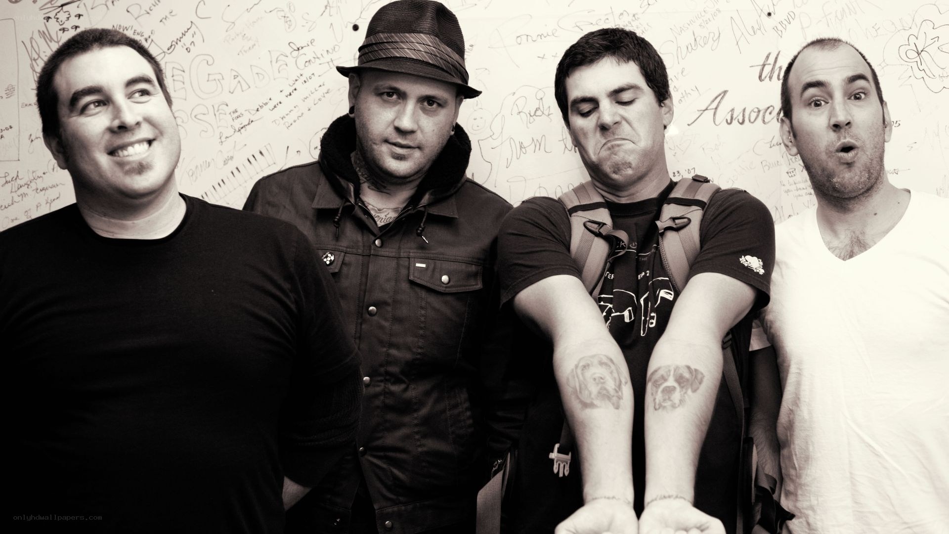 band members posing together