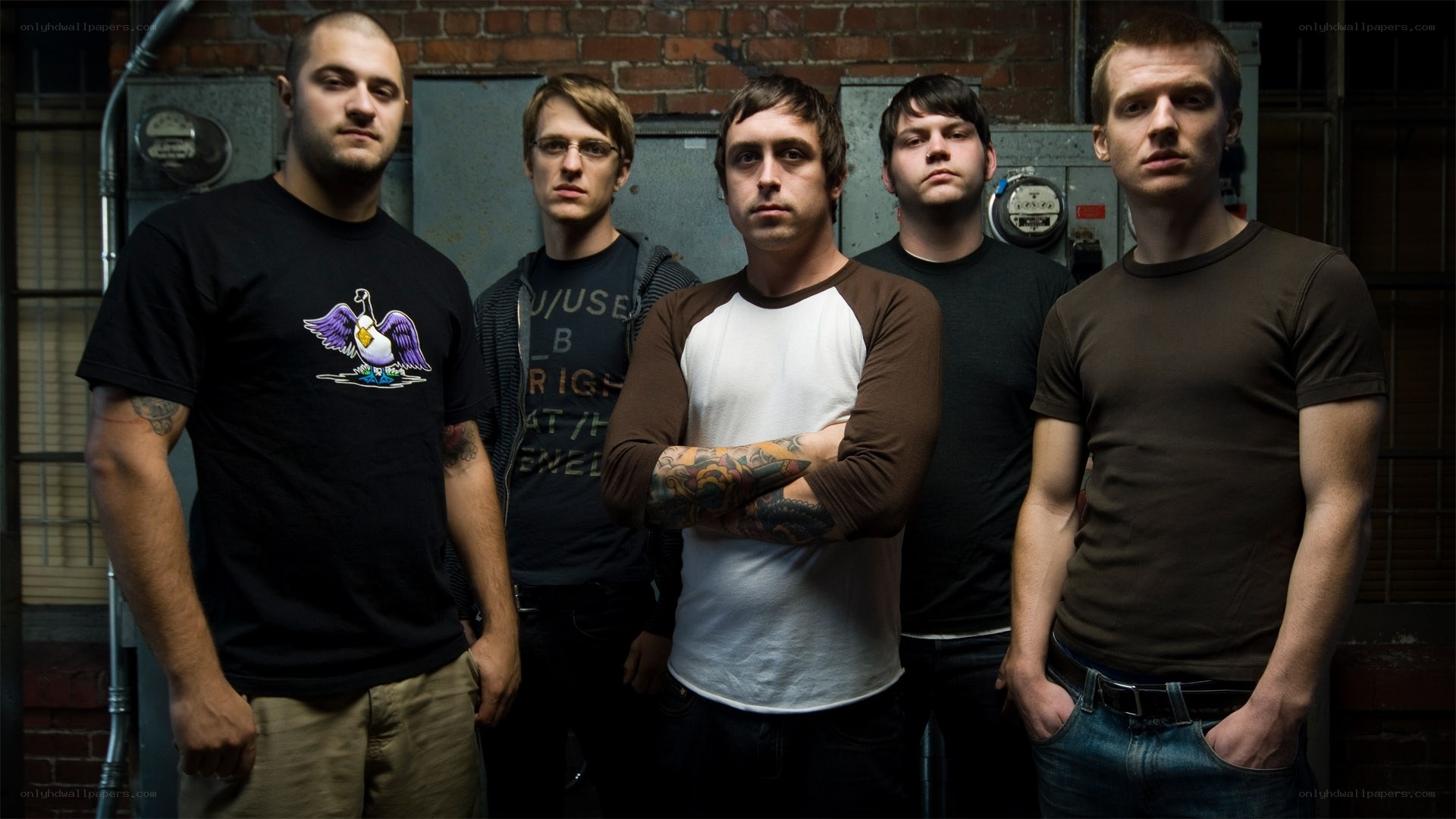 band members posing together