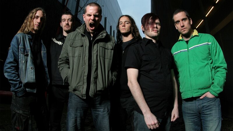 band members posing together