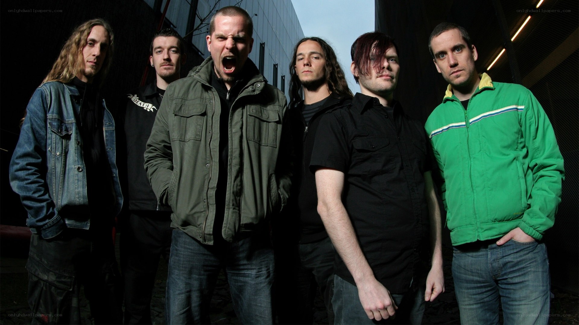band members posing together