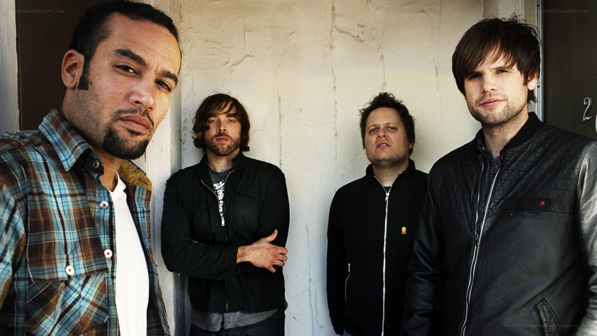 band members posing together