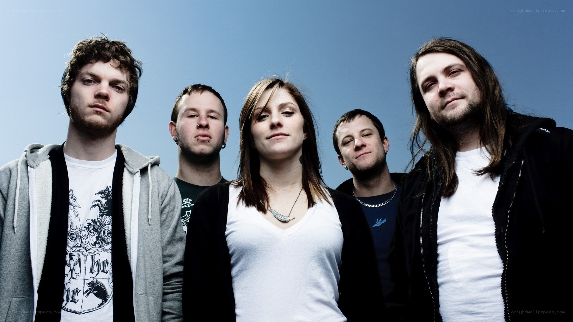 band members posing together