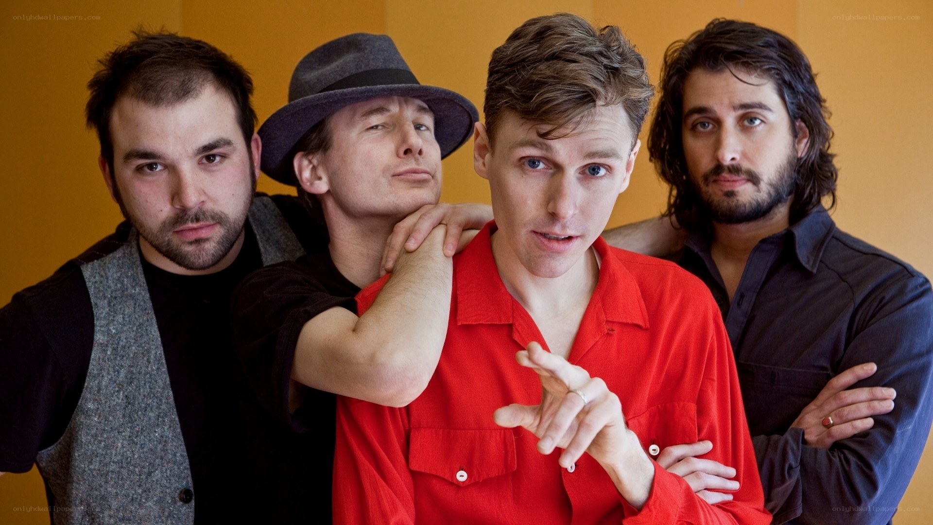 band members posing together