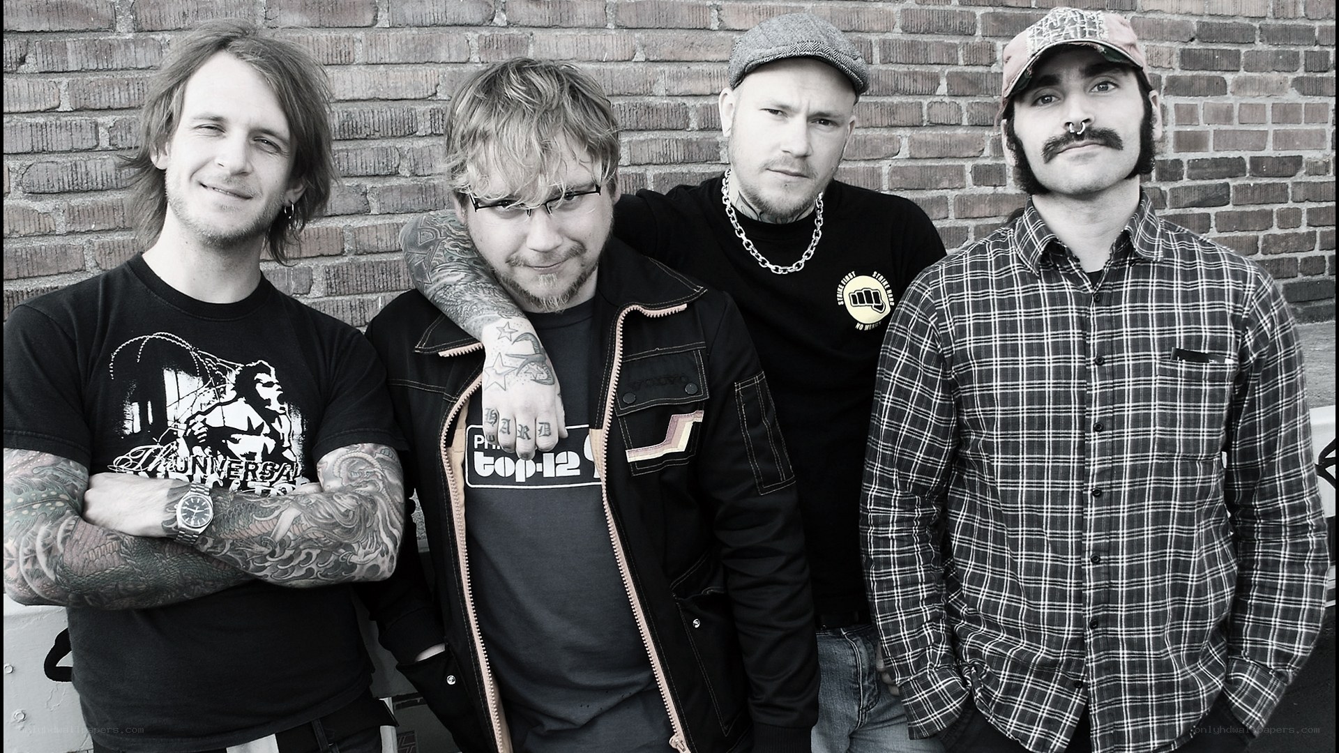 band members posing together