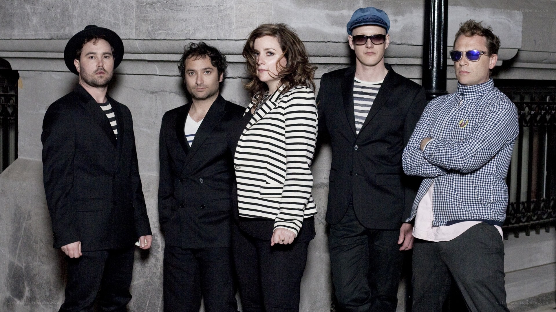 band members posing together