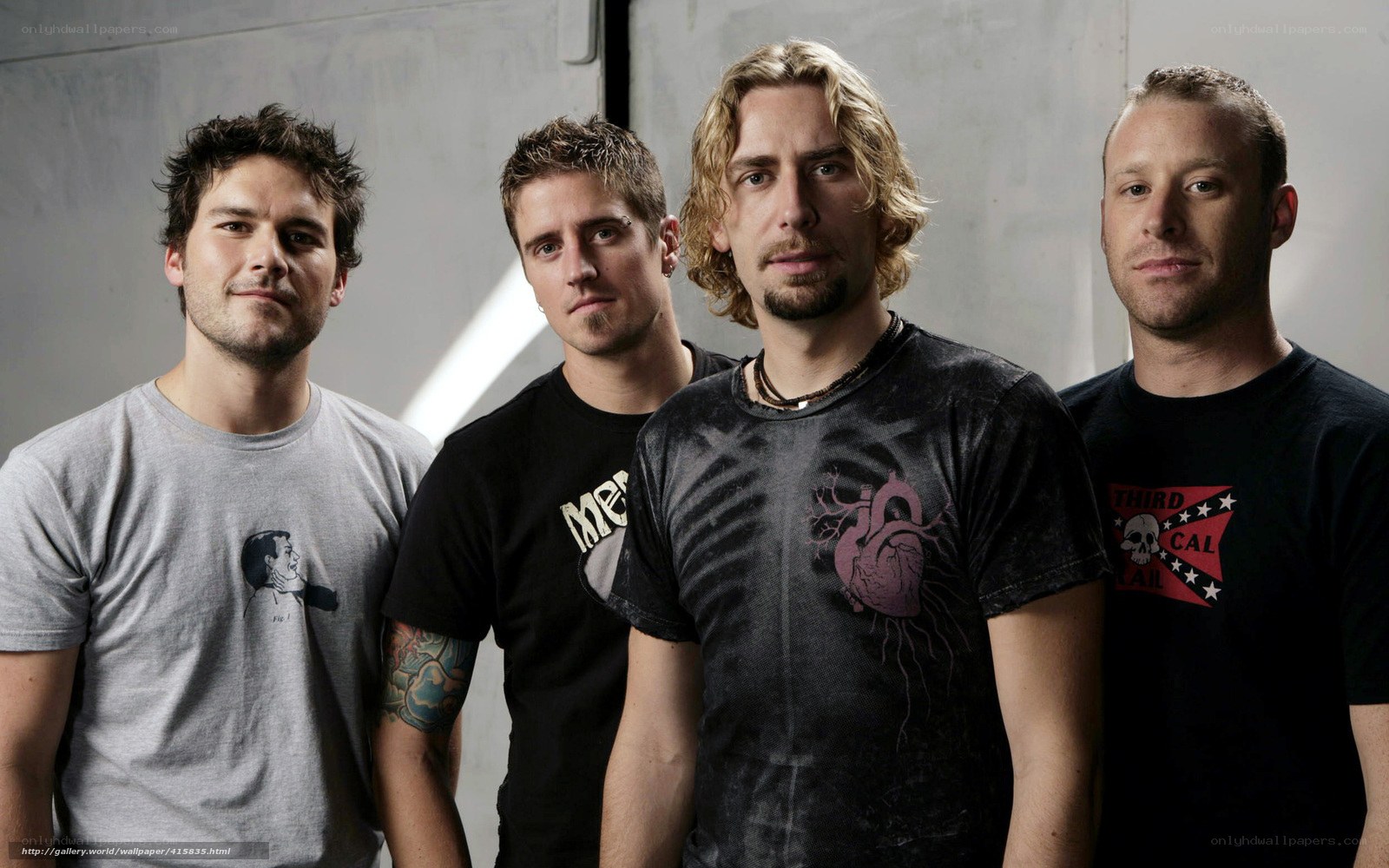band members posing together