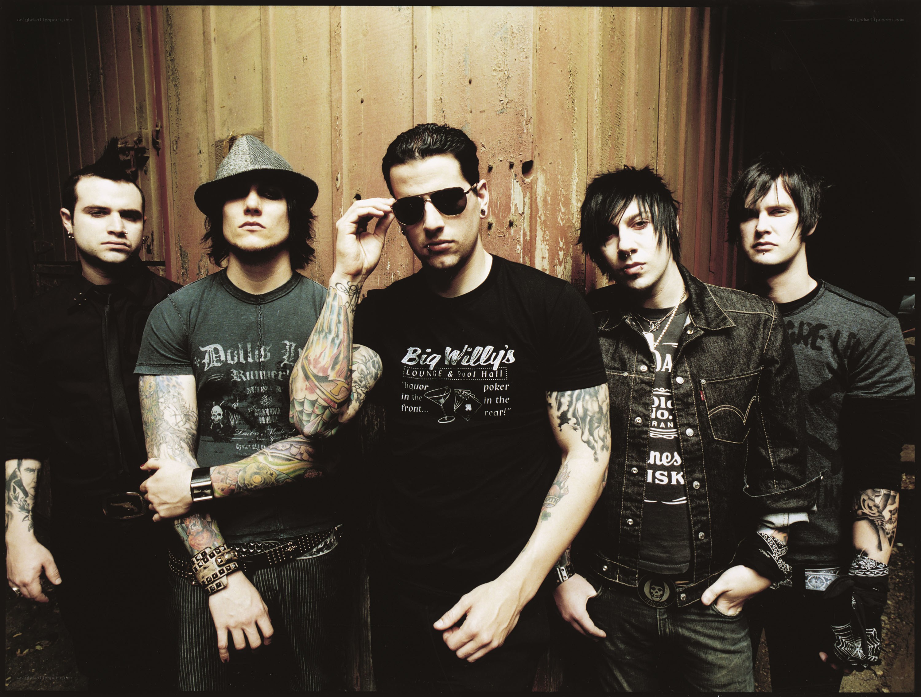 band members posing together