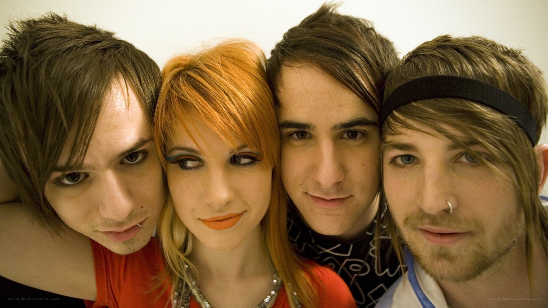 band members posing together
