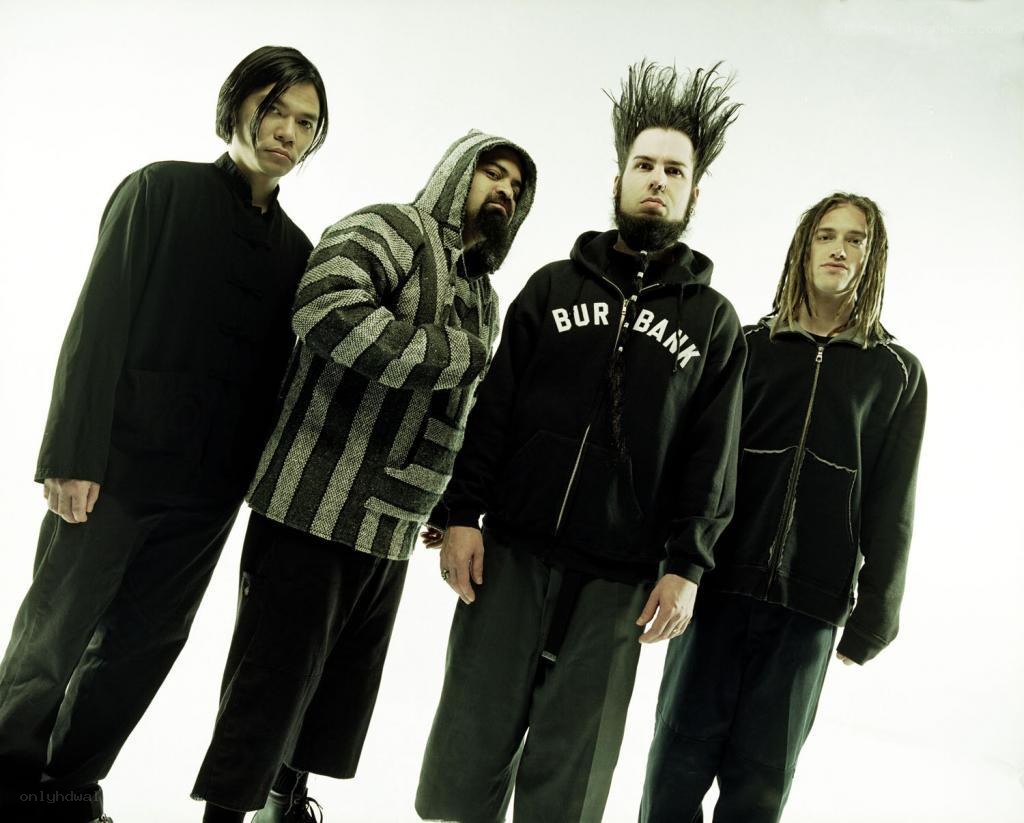 band members posing together