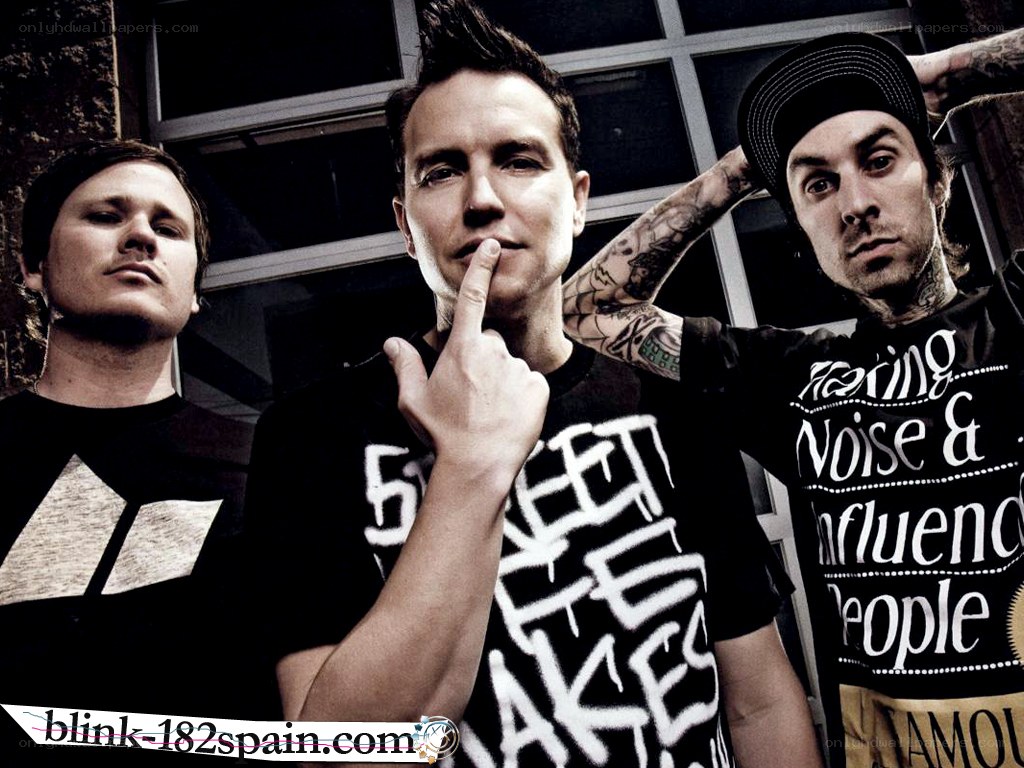 band members posing together
