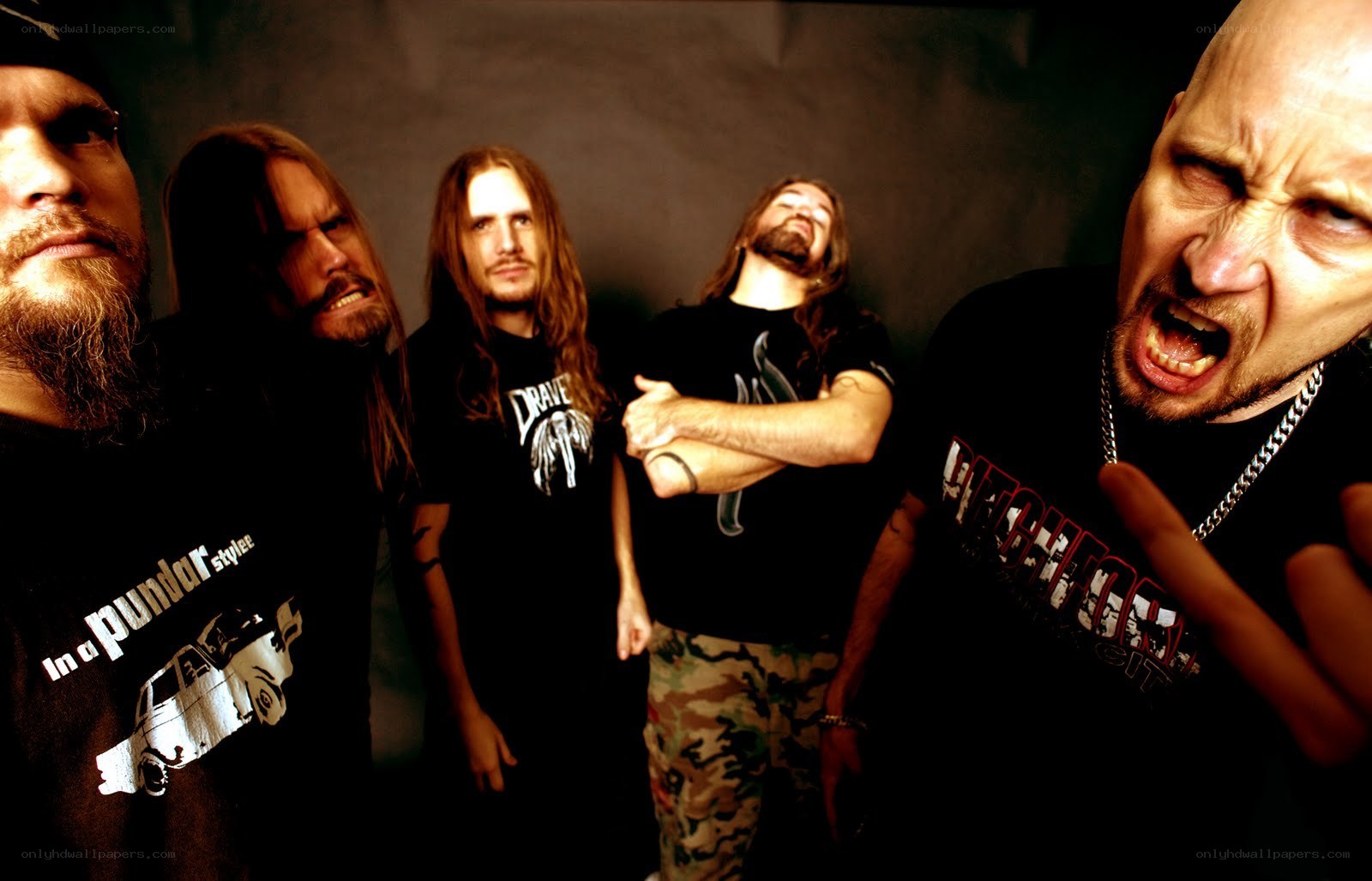 band members posing together