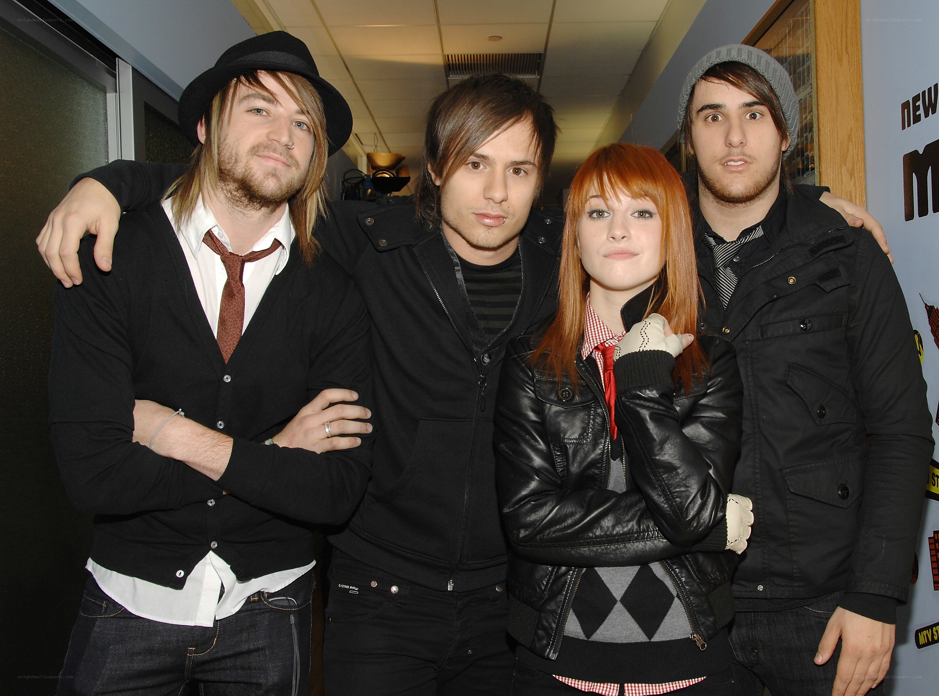 band members posing together