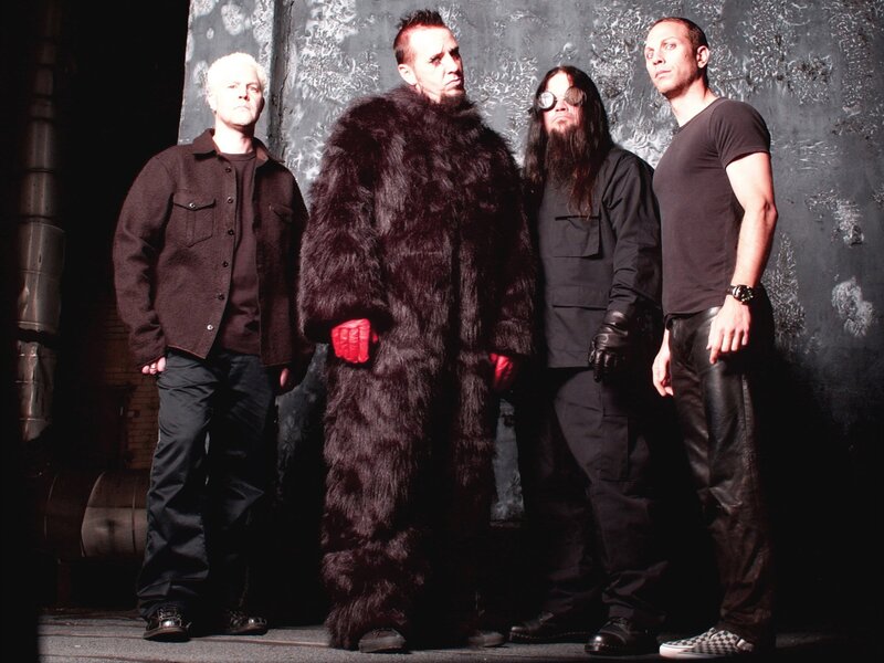 band members posing together