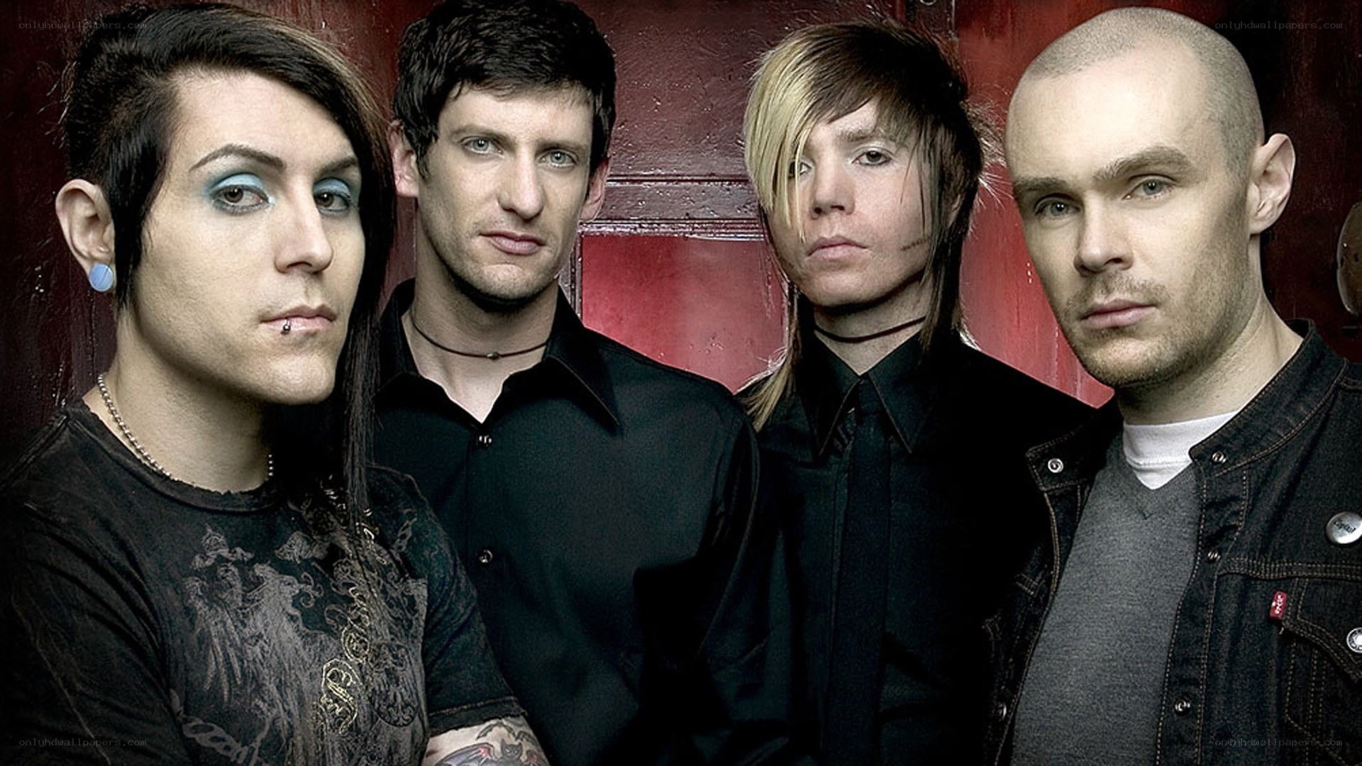 band members posing together