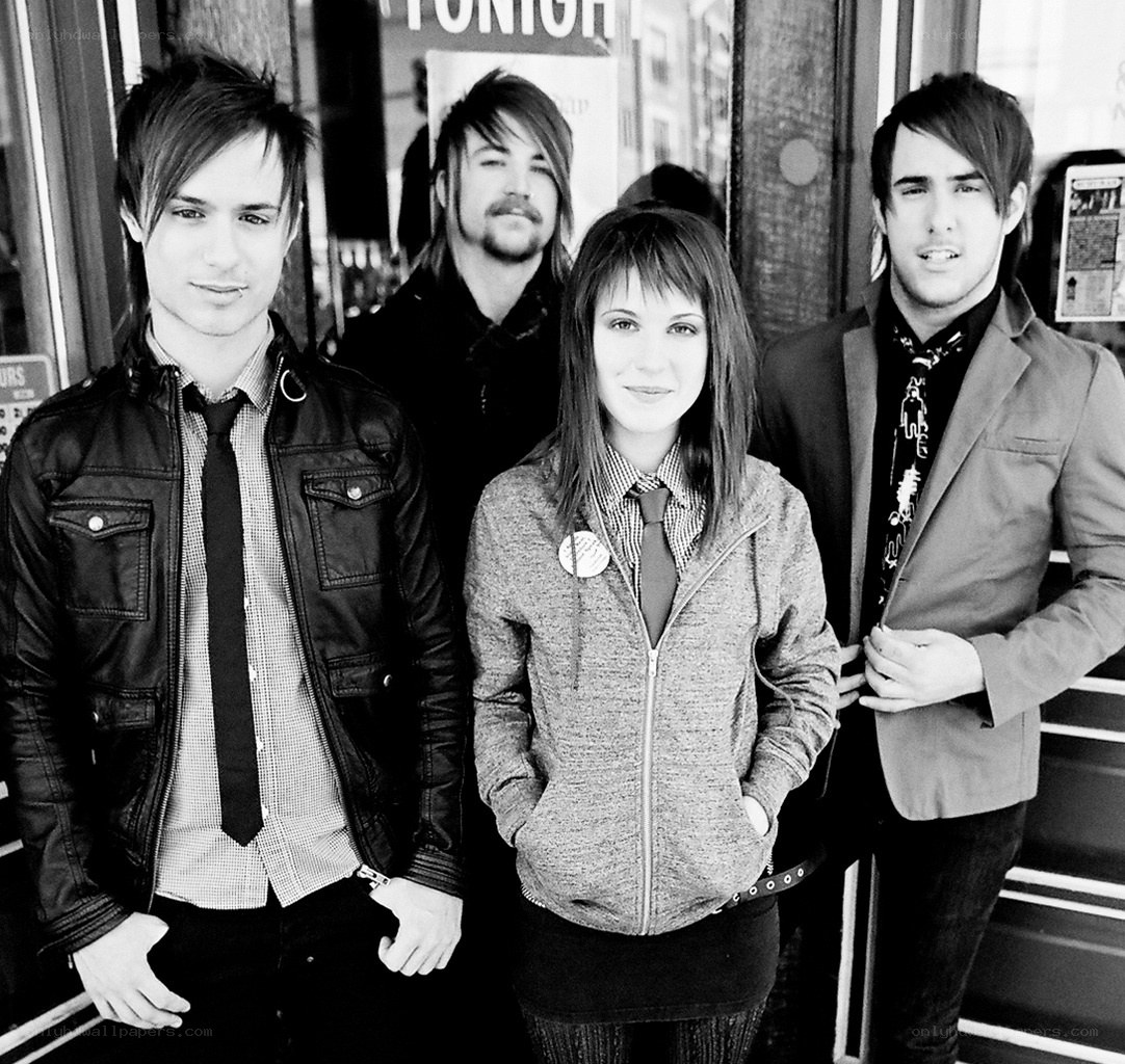 band members posing together